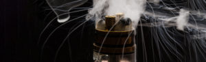 Vape close-up with smoke on a black background