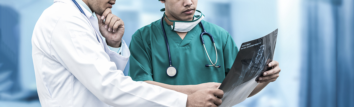 Doctors analyzing x-ray