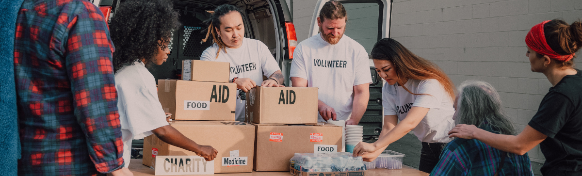 People gathering to provide aid packages.