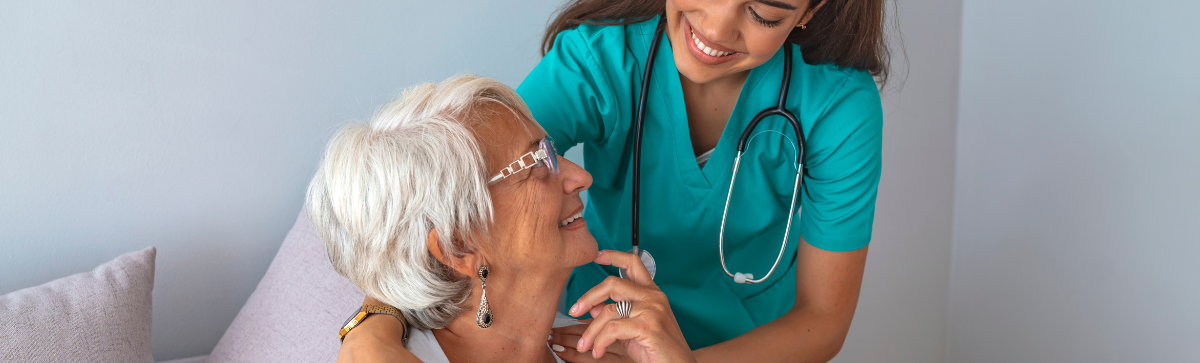 Staff caring for a senior living resident.