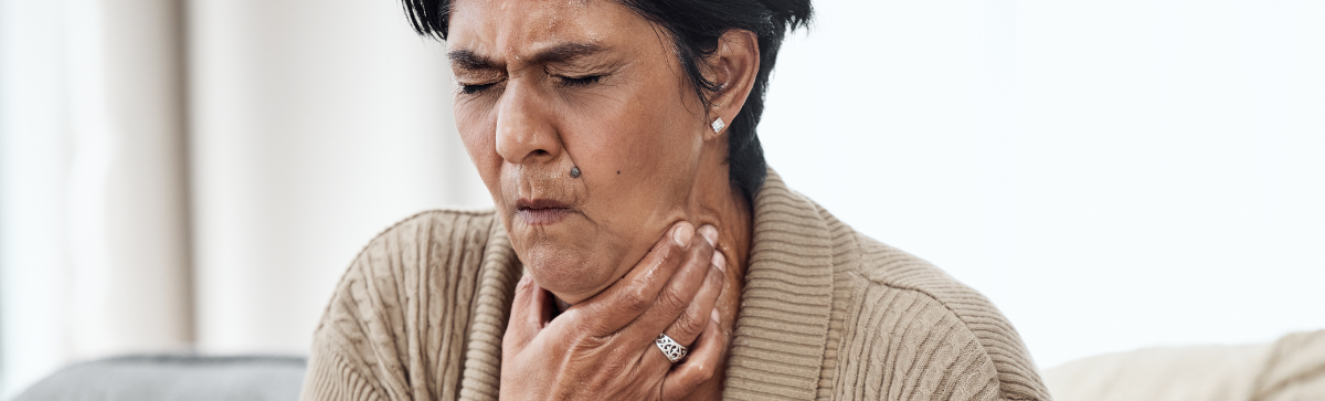 Elderly woman choking.