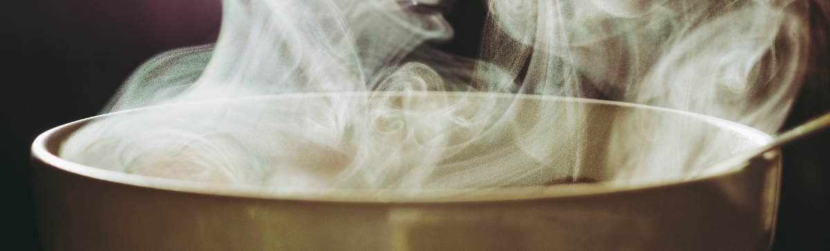 Image of steaming liquid in cup.